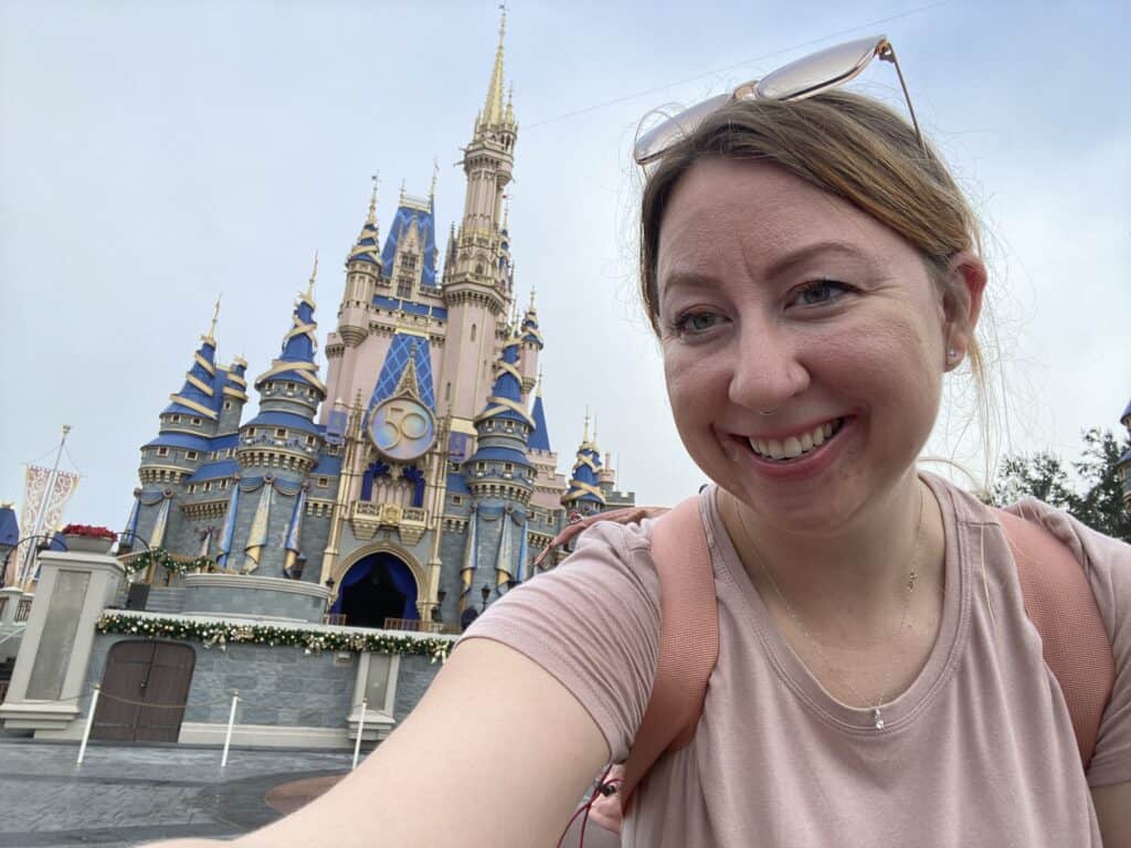 beth in front of cinderella's castle
